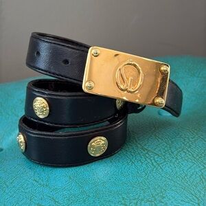 St. John black leather belt gold tone medallions and statement logo buckle sz S